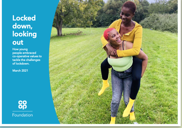 The title, Locked down, looking out - young people embracing co-operative values to tackle lockdown challenges, published by Co-Op. Two young women in a garden, one giving other piggy back, both smiling
