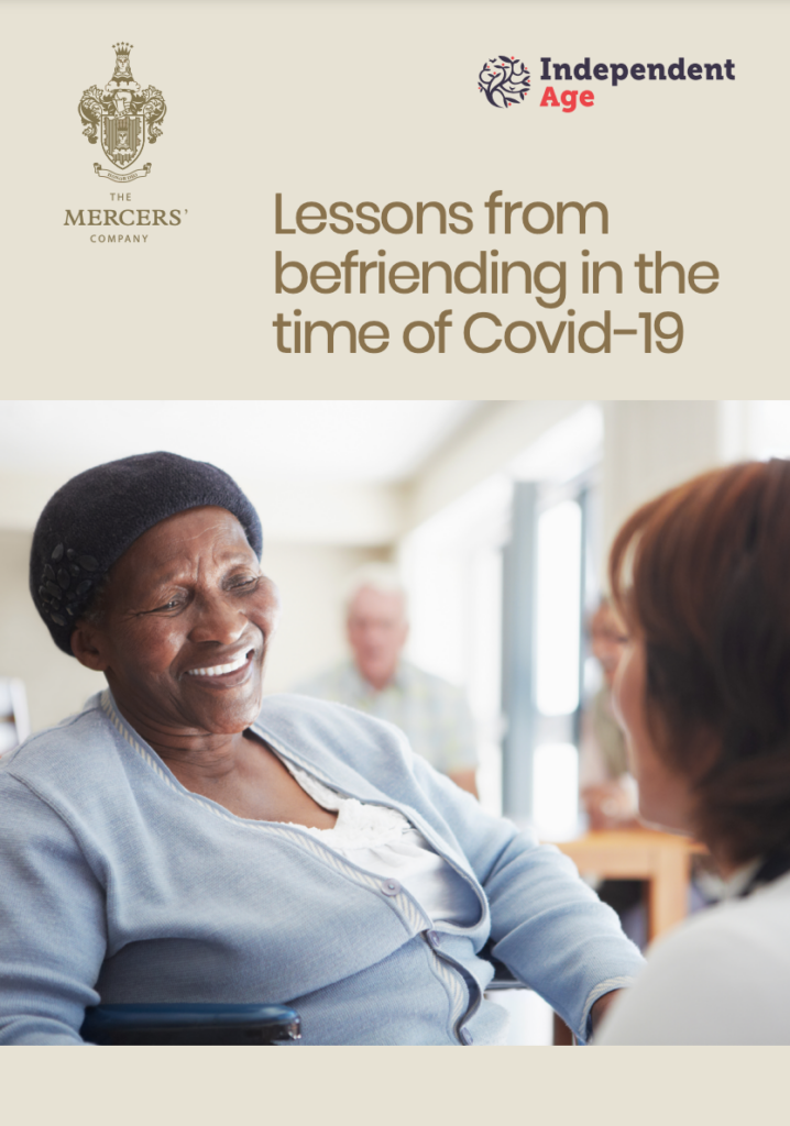 Front page of the report with text that says 'Lessons learned from befriending in the time of Covid-19'. The image is a photo of two people talking to each other.