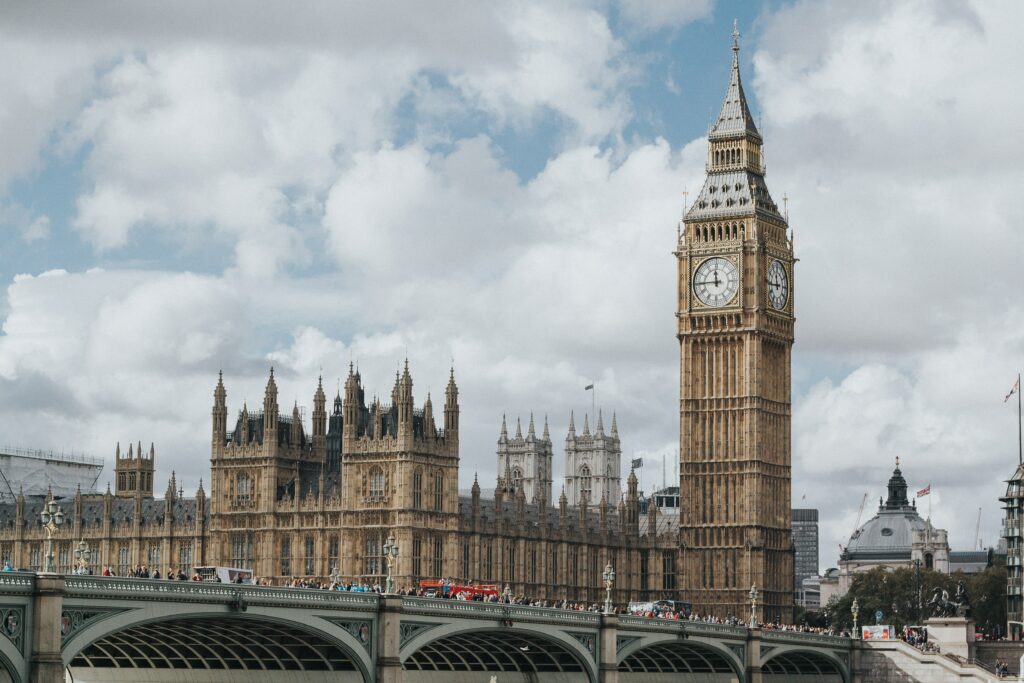 The Palace of Westminster, with a busy Westminster Bridge in the foreground.